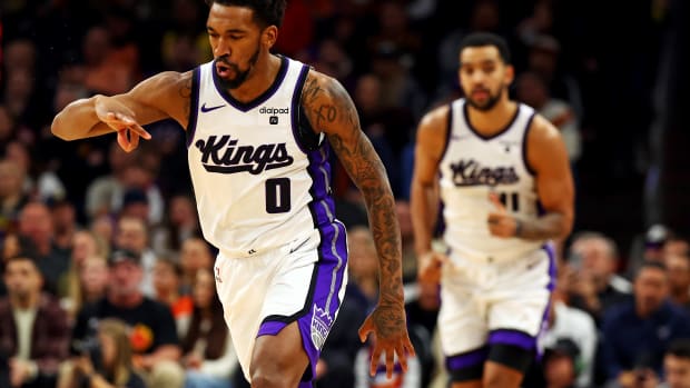 Jan 16, 2024; Phoenix, Arizona, USA; Sacramento Kings guard Malik Monk (0) celebrates after a play during the second quarter against the Phoenix Suns at Footprint Center. Mandatory Credit: Mark J. Rebilas-USA TODAY Sports